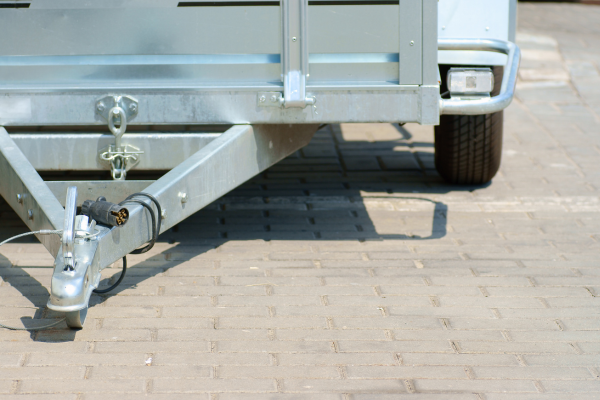 A close-up of a tow behind trailer.